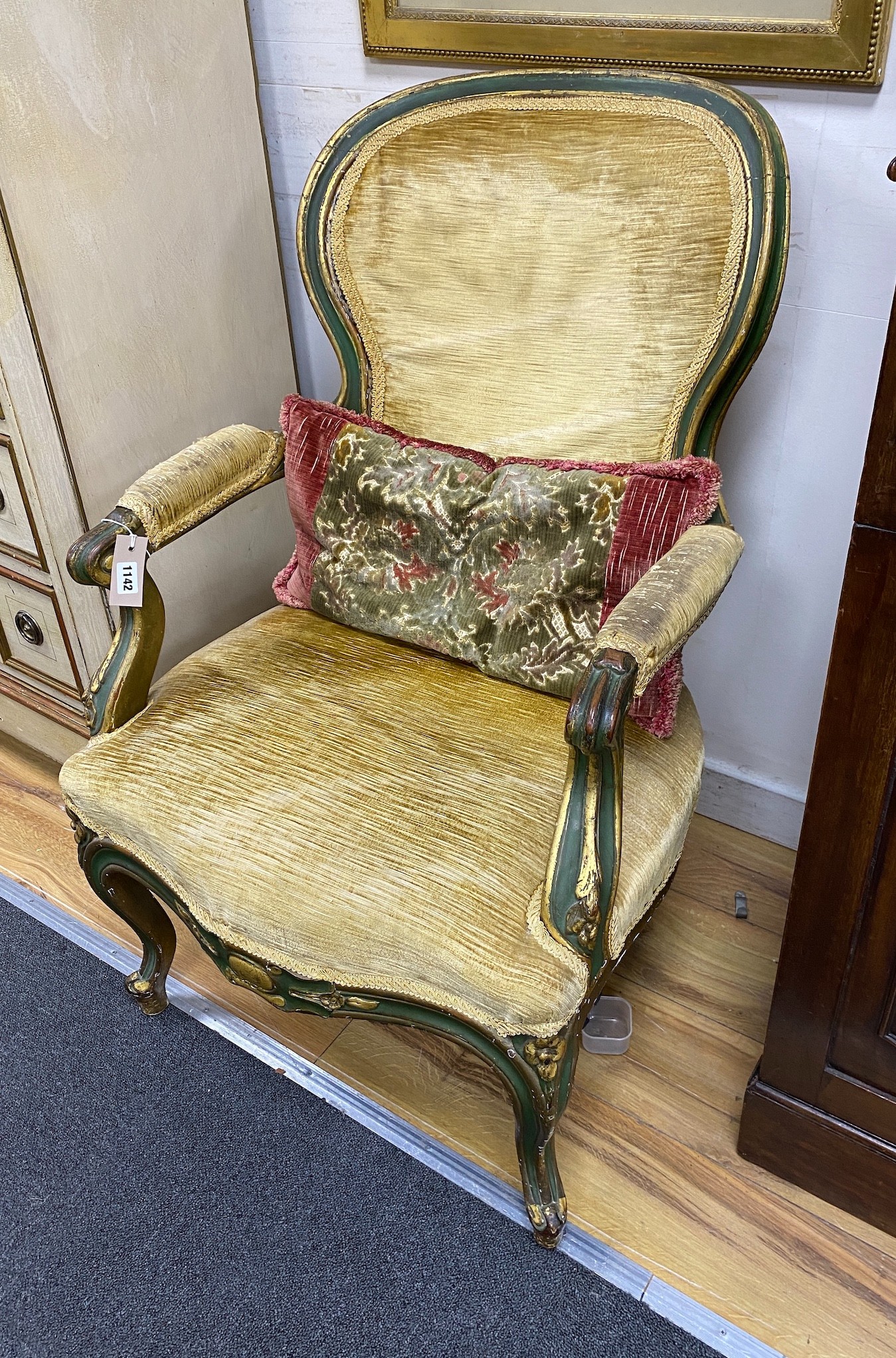 A 19th century French upholstered elbow chair, re-painted, width 60cm, depth 64cm, height 85cm